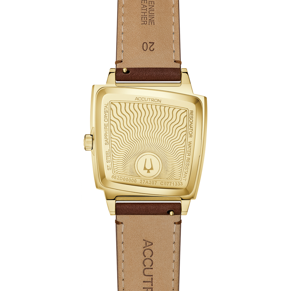 Gold-toned cushion-shaped watch back with engraved case back and brown leather strap