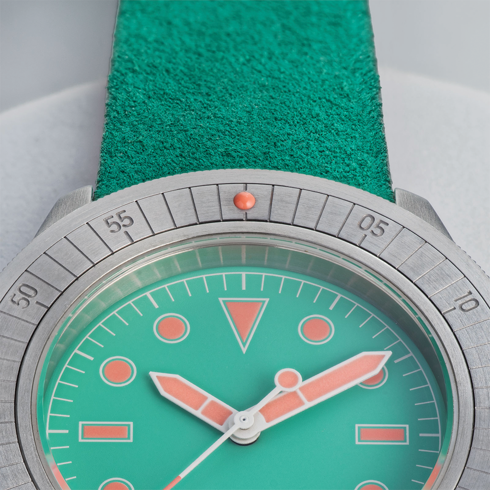 U1-RIO Modello Uno turquoise dial watch on teal leather strap close-up of bezel