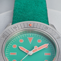 U1-RIO Modello Uno turquoise dial watch on teal leather strap close-up of bezel