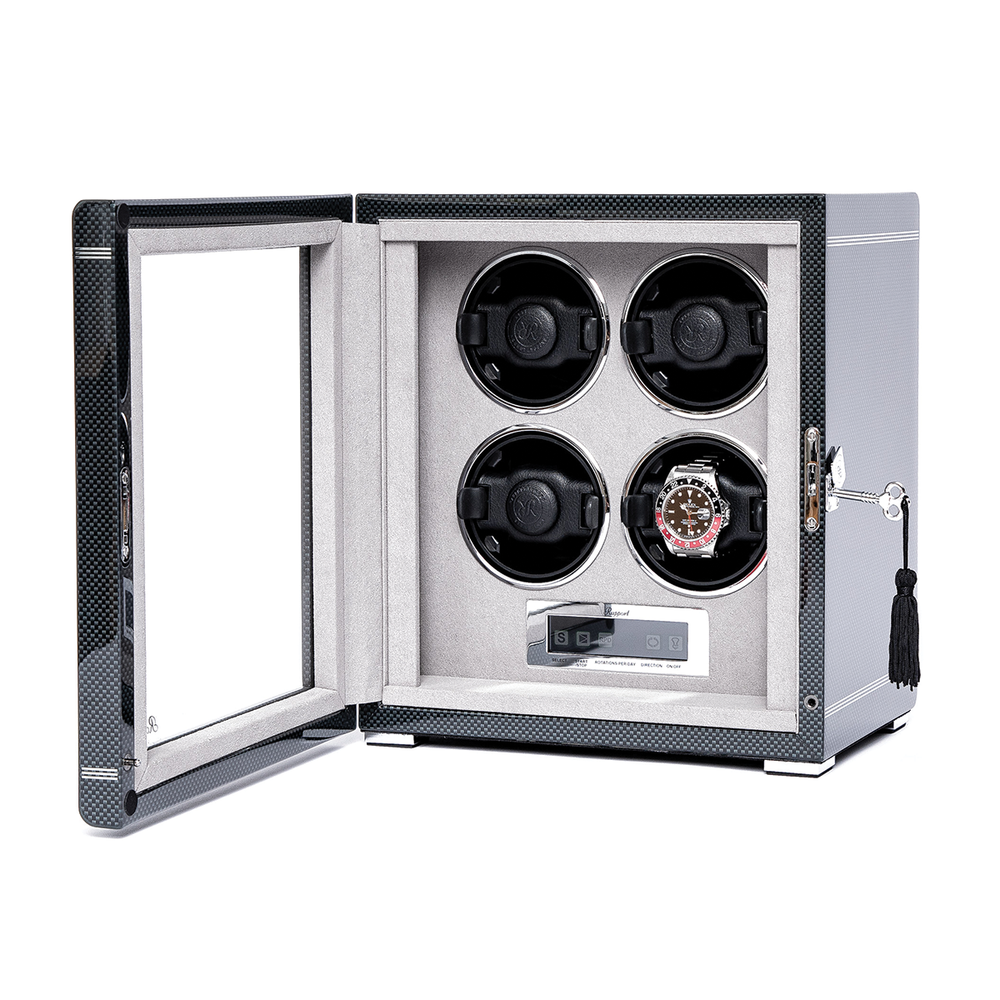 Open Formula Quad Watch Winder silver showing four circular slots with a watch mounted in the bottom-right slot