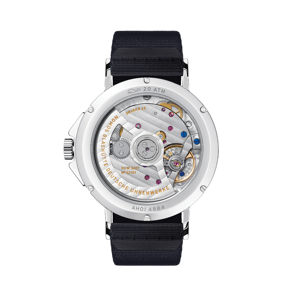 Side profile of Ahoi Neomatik Sky watch with navy fabric strap and knurled crown
