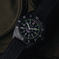 Close view of SSNAV-D Auto U.S. 250 Limited Edition 41mm black dial watch with green lume on rubber strap