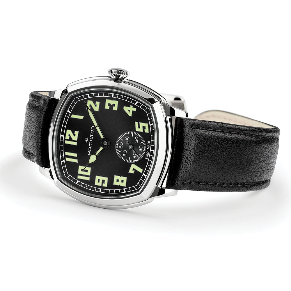 Hamilton American Classic Cushion Mechanical 34mm watch with black dial and lime luminous numerals on a black leather strap.