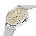 Nomos Ahoi Neomatik Sand 36mm beige dial on light fabric strap, angled side view