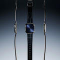 Three-view studio shot of blue sunray dial watch on a dark blue leather strap.