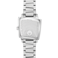 Back of Accutron Memphis 521 bracelet watch with wavy pattern case back and stainless steel bracelet