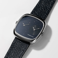 Front view of ALD Dual Time watch showing starry blue aventurine dial and a secondary subdial on steel case