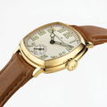 Close-up of the gold-tone cushion case Hamilton watch with beige dial and brown leather strap