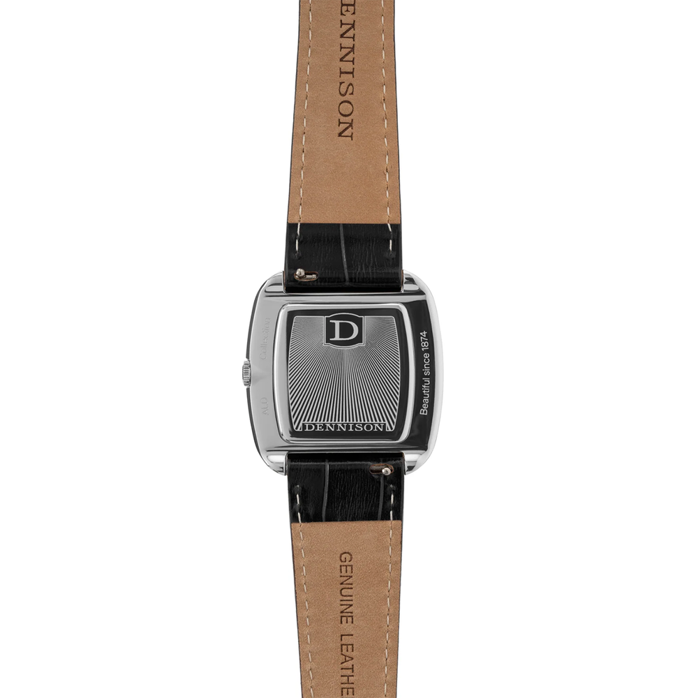 Back view of a Dennison timepiece in steel 37mm with black leather strap, case back featuring a D logo and sunburst pattern