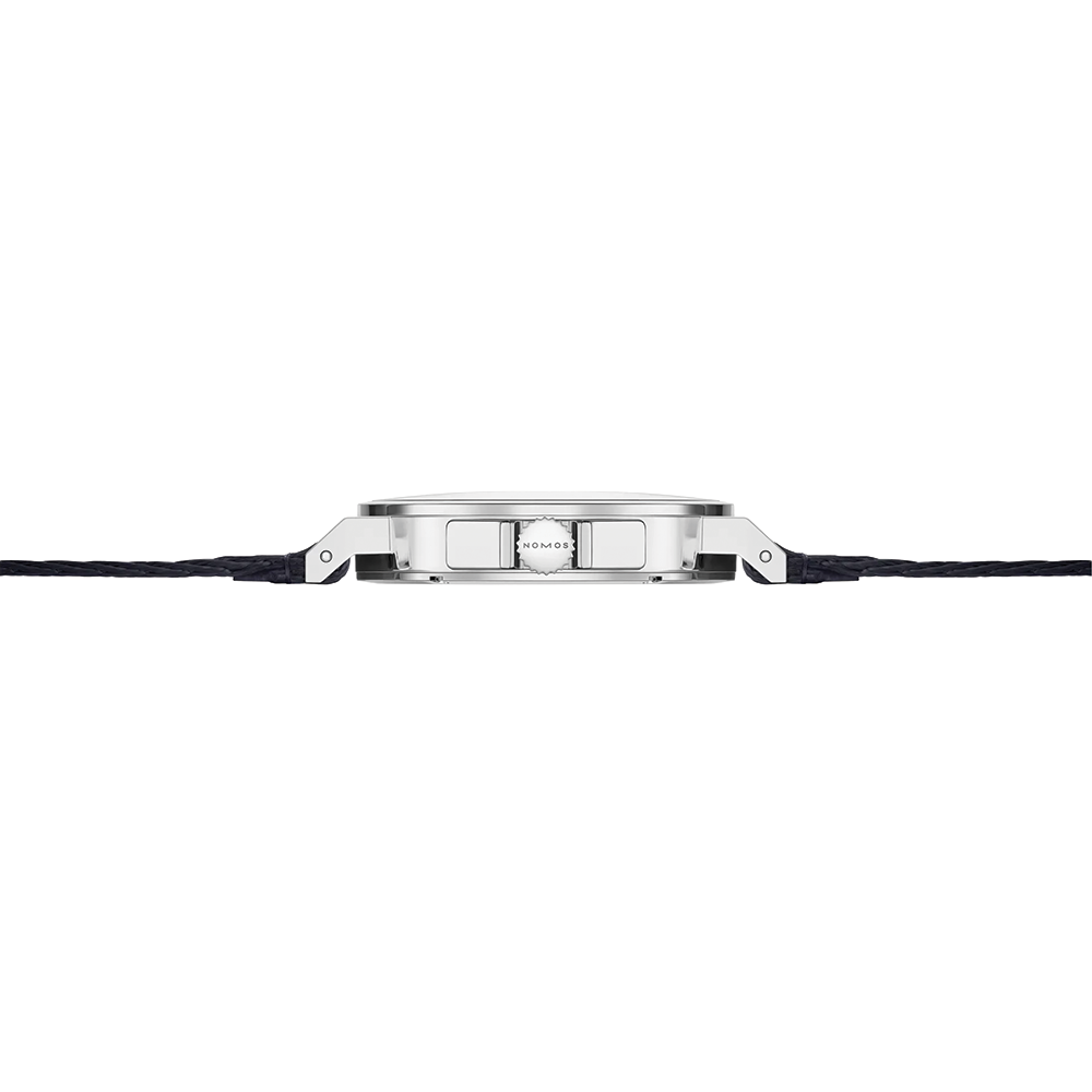 Rear view of Ahoi Neomatik Sky with sapphire case back showing movement and navy fabric strap