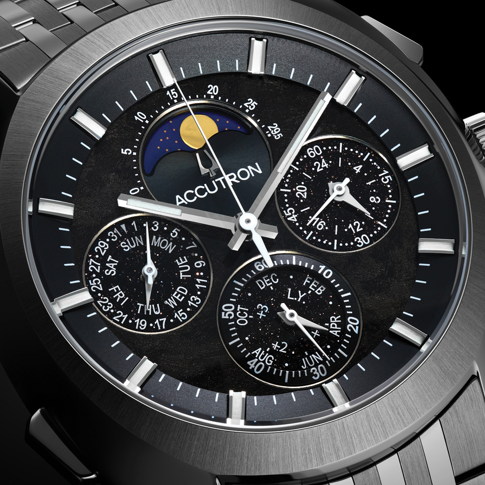 Close up of Horizon 41.5mm black dial with moon phase and intricate subdials on a brushed stainless steel case