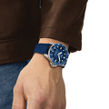 Wrist shot of the blue Seastar 2000 professional on blue rubber strap.