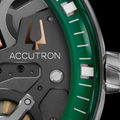 Close-up of Accutron Spaceview DNA case back with dark metal plate and green bezel