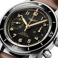 Close-up of Longines Spirit Pilot Flyback dial with gold hands and numerals and two subdials.