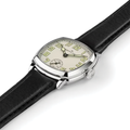 Side view of cushion shaped American Classic Mechanical watch with beige dial on black leather strap