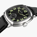 Close-up of American Classic Cushion Mechanical 34mm watch showing a black dial with oversized luminous numerals and a small seconds subdial.