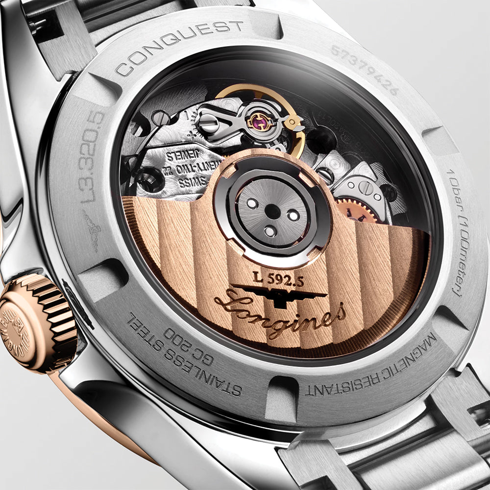 Conquest 30mm - Silver w/ Pink Gold Bezel on Bracelet