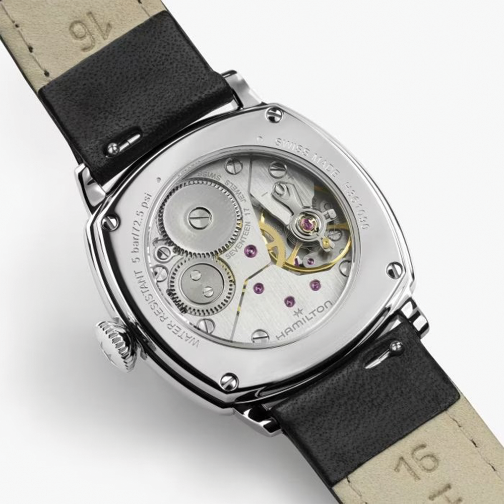 Back view of Hamilton American Classic Cushion Mechanical 30mm watch with a beige leather strap and visible movement.