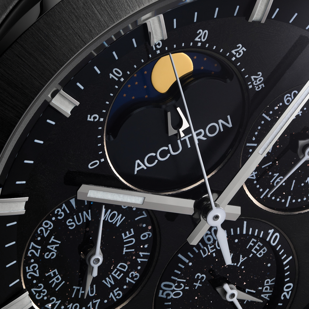 Macro view of Horizon watch dial highlighting moon phase window and Accutron branding with surrounding subdials