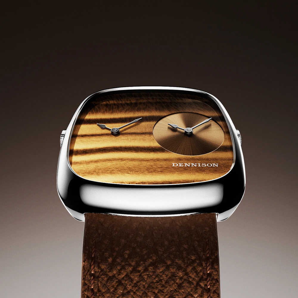 Dennison ALD Dual Time watch with tiger eye wood dial and gold sunray finish in rounded silver case on brown leather strap