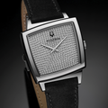 Close-up angle of Memphis 521 watch showing a diamond studded dial and black leather strap