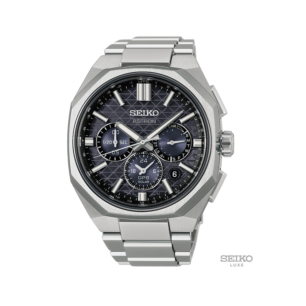 Seiko Astron 43.4mm stainless steel bracelet watch with a dark patterned dial and silver markers