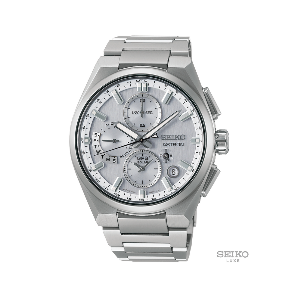 Seiko Astron 42mm silver watch on a brushed stainless bracelet with multiple subdials and a date window
