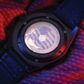 Back view of SSNAV-D Auto U.S. 250 Limited Edition 41mm watch with black case and flag motif through the caseback.
