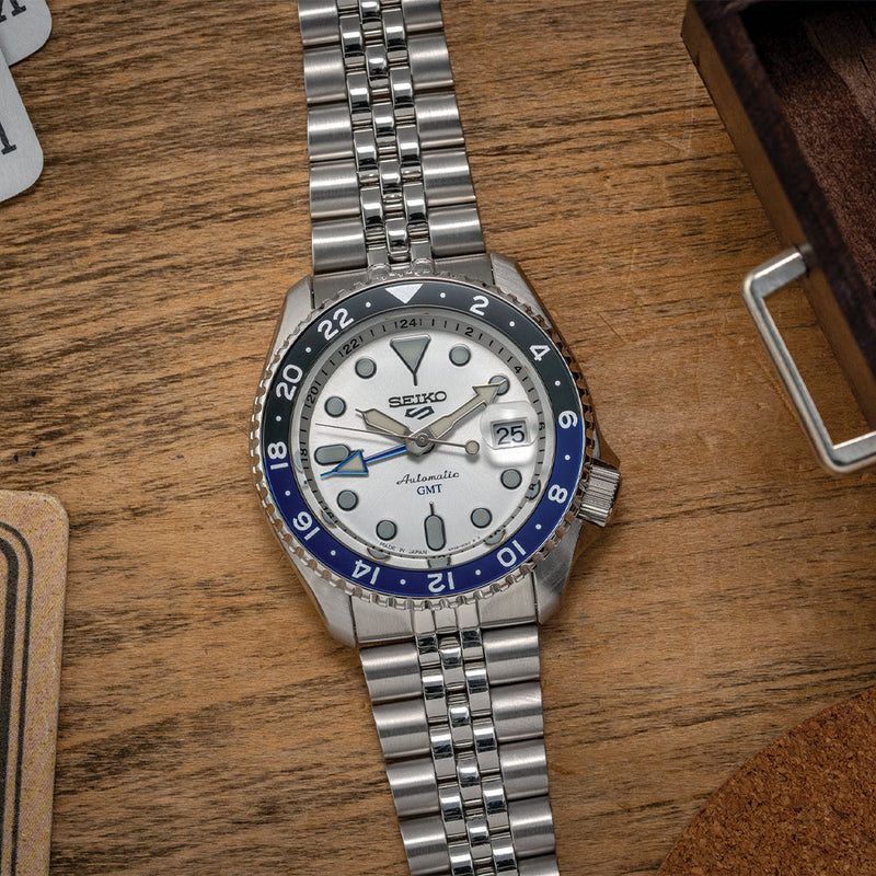 Seiko 5 SKX GMT SSK033 on a stainless steel bracelet with white dial