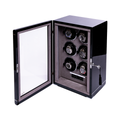 Open view of Formula Six Watch Winder in black showing six watches in individual slots and a digital control panel at the base