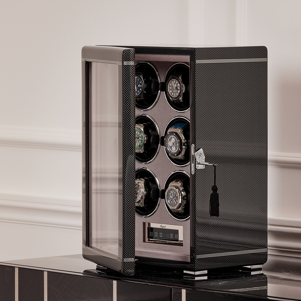 Formula Six Watch Winder in black carbon fiber finish with glass door open and six watches displayed inside