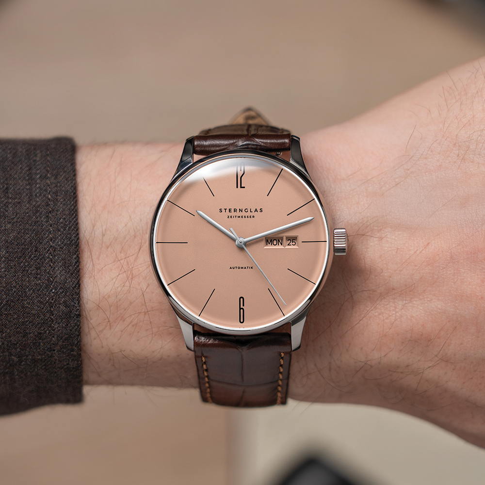 Berlin Automatic 38mm copper beige dial on brown leather strap worn on the wrist